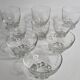 Set of Art Deco style engraved crystal bowls and glasses on spherical feet