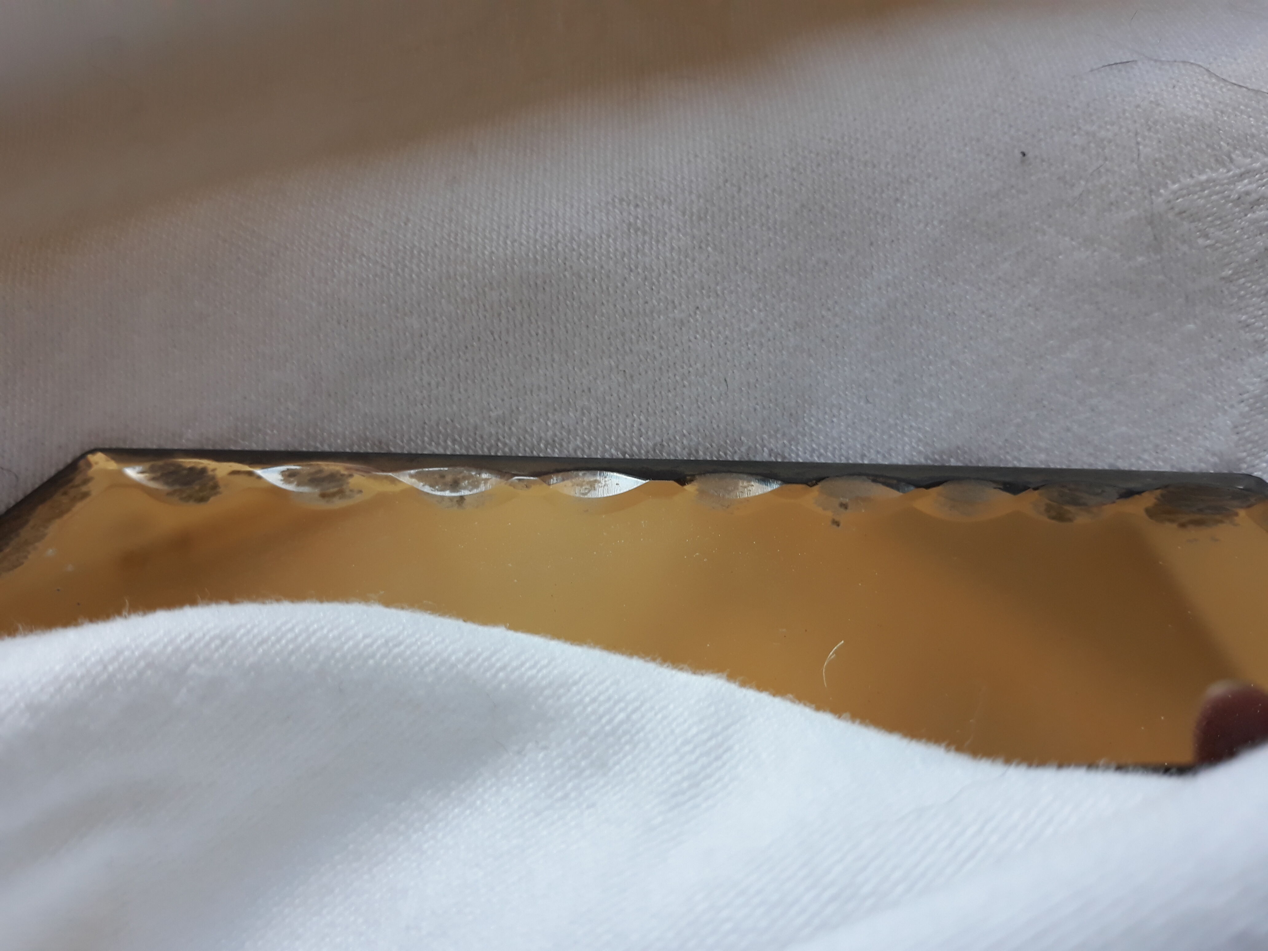 Ancient octagonal bevelled mirror 24x24cm