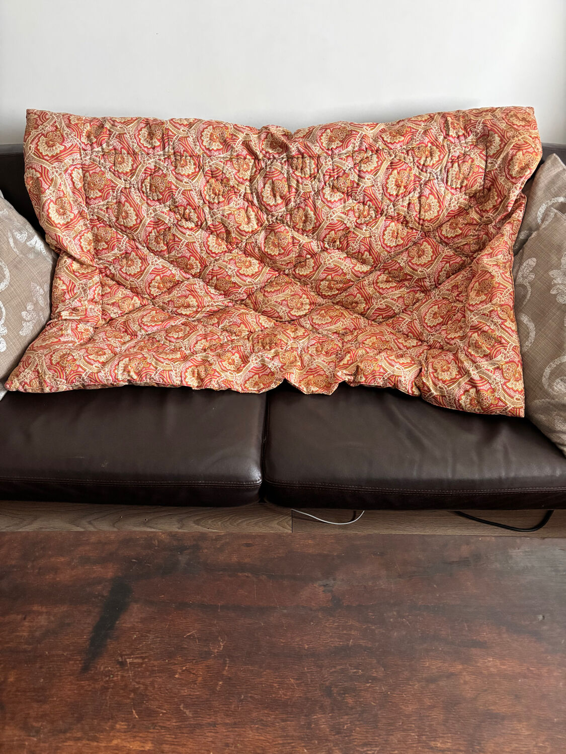 Vintage duvet/bedspread with a paisley pattern.