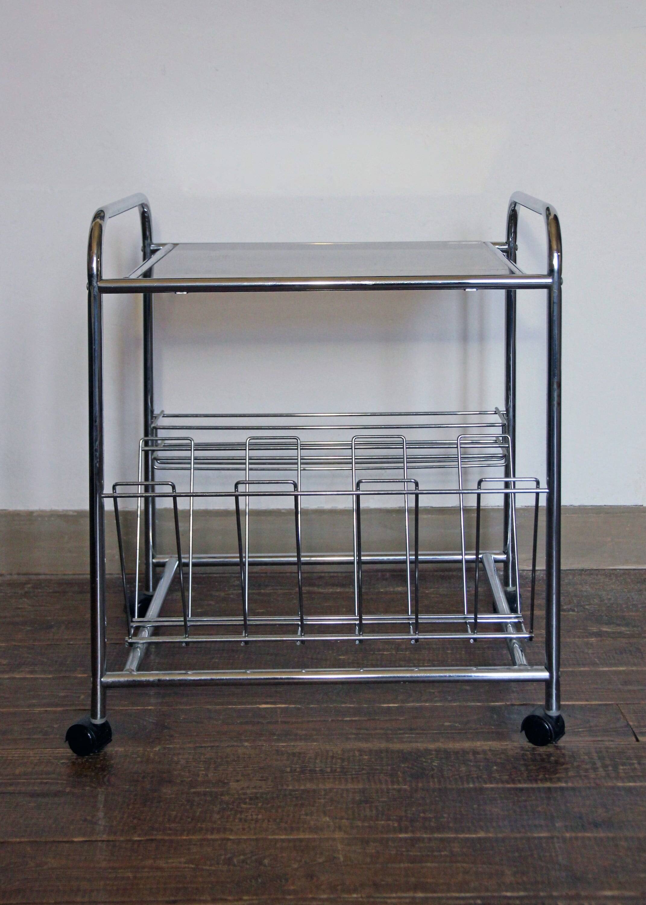 Stainless steel magazine holder side table