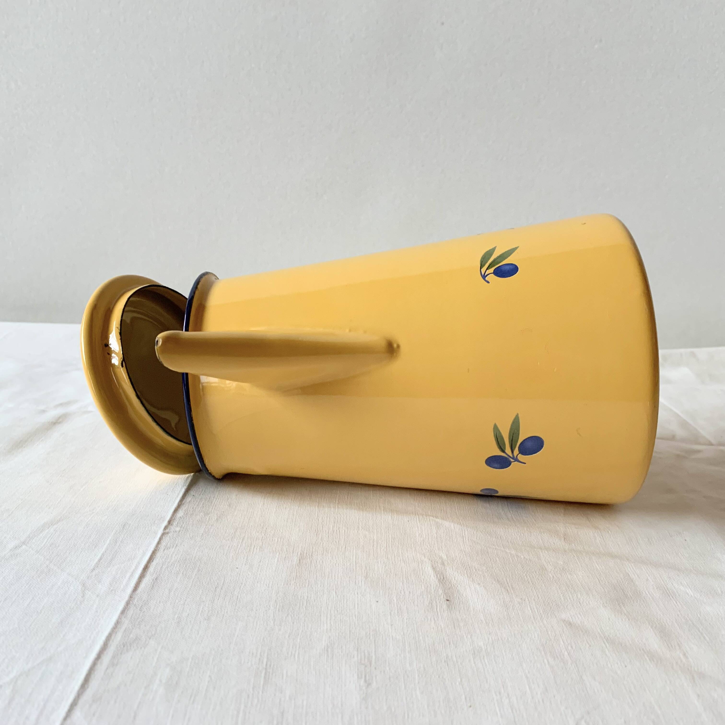 Old coffee maker in yellow enameled sheet metal - olive decor