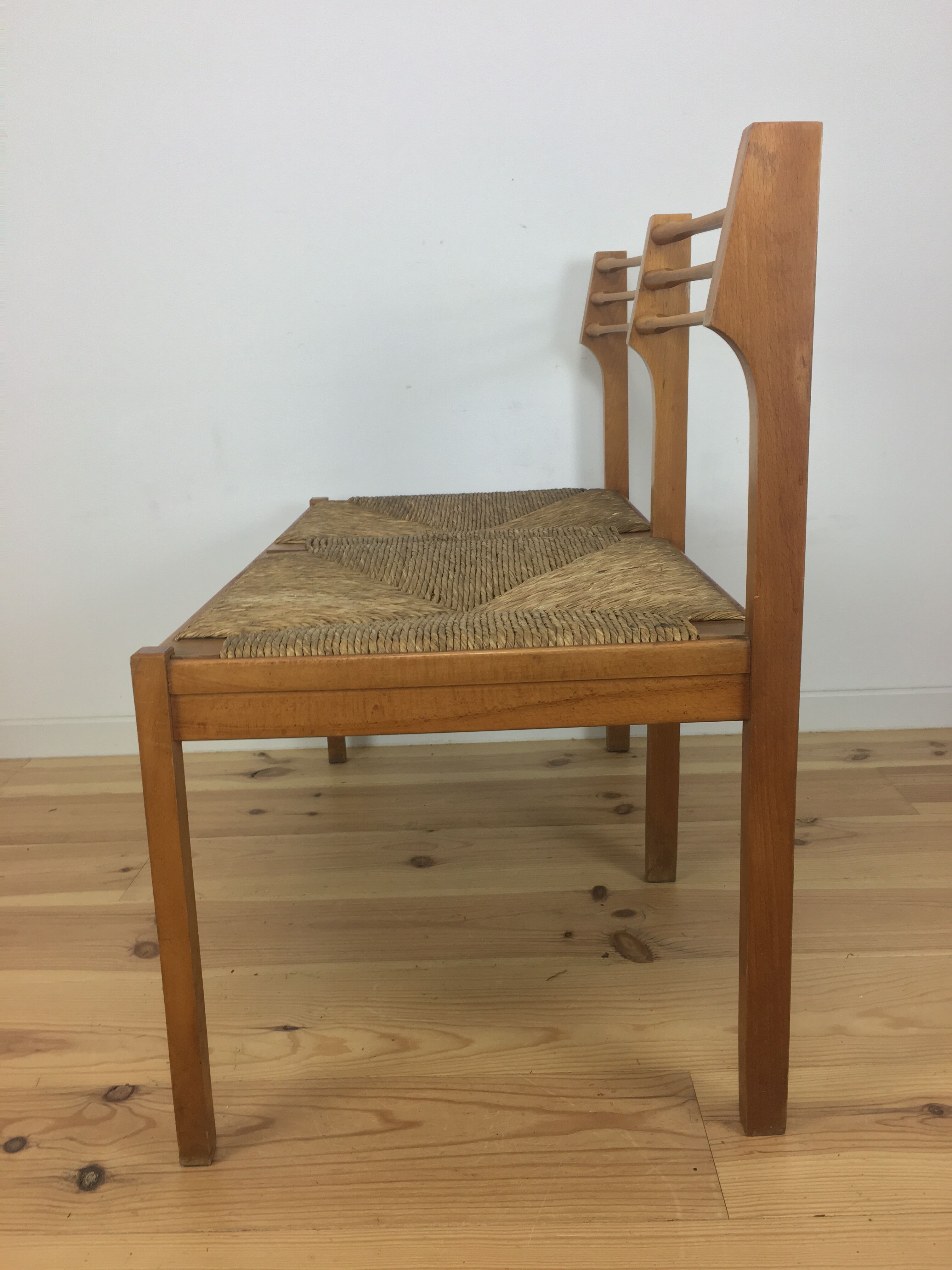 Wooden mulched modernist bench in 1950s