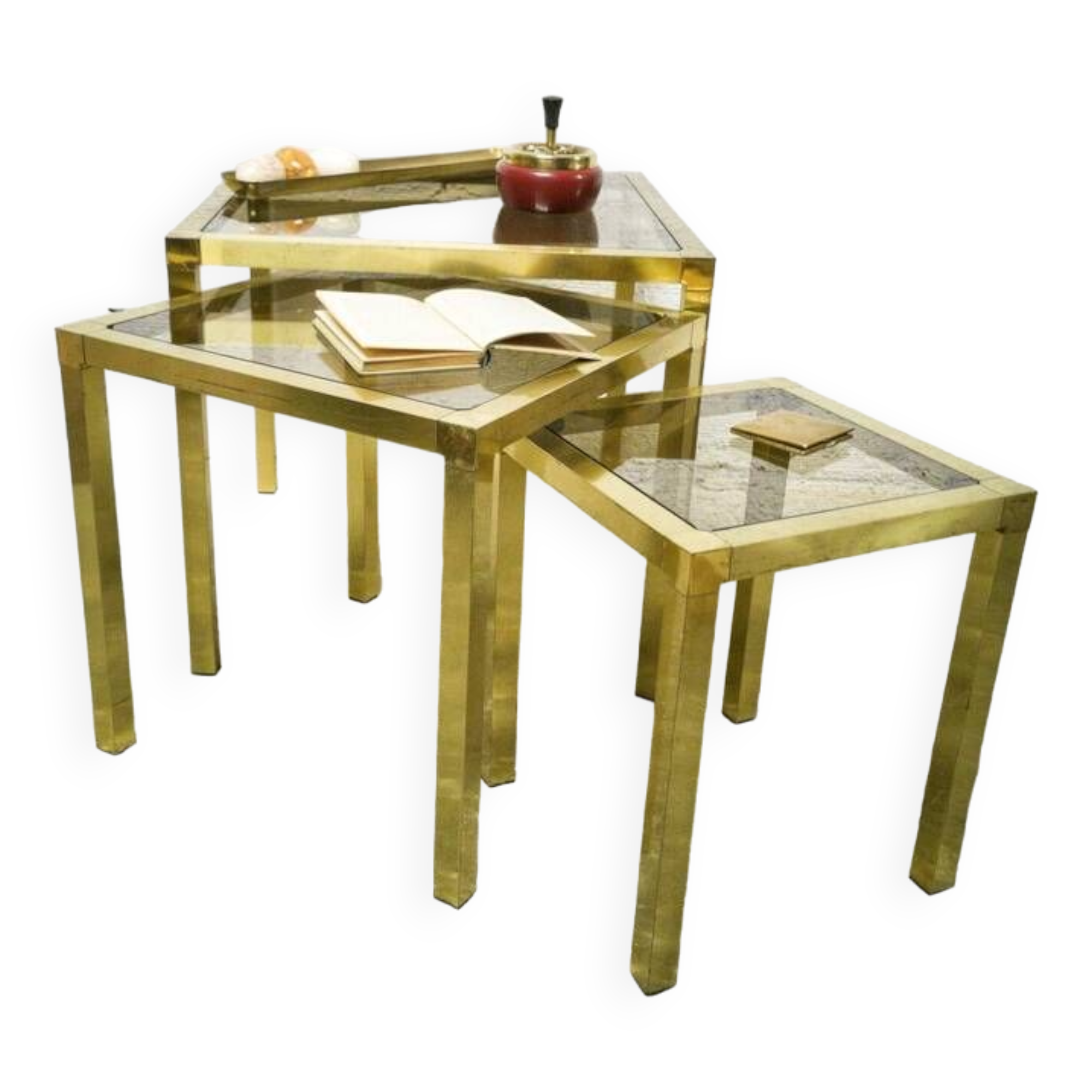 Trio of nesting tables in brass and smoked glass