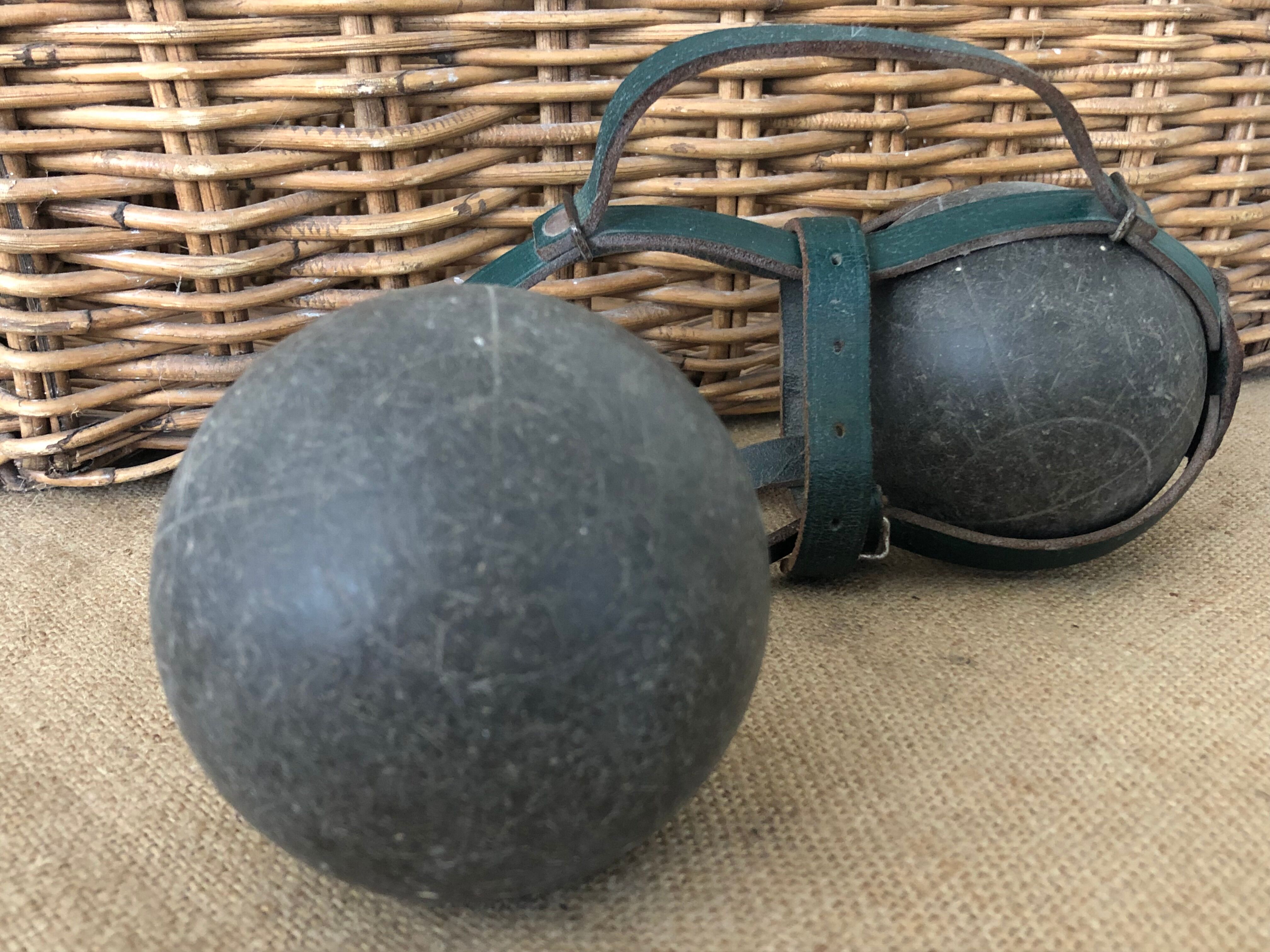 Petanque balls in their strap bag
