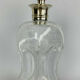 Blown glass carafe with silver frame and cap