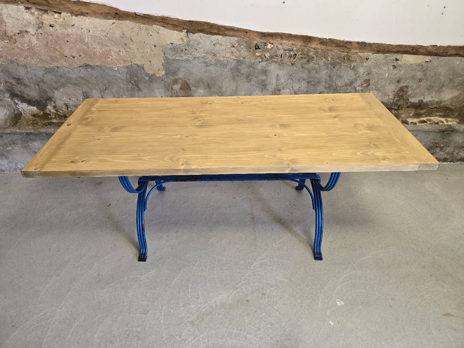 Wrought iron and solid wood table