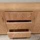 Vintage wicker sideboard with flowers