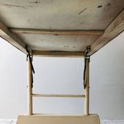 Wood and wicker cradle from the 1950s.