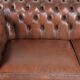 Canapé chesterfield 2,5 places en cuir de vachette vintage au look robuste