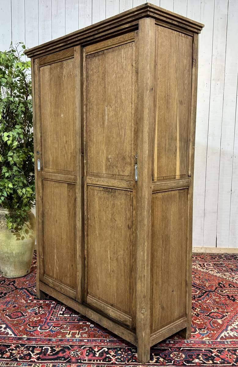 Oak wardrobe with sliding doors from the 1930s.