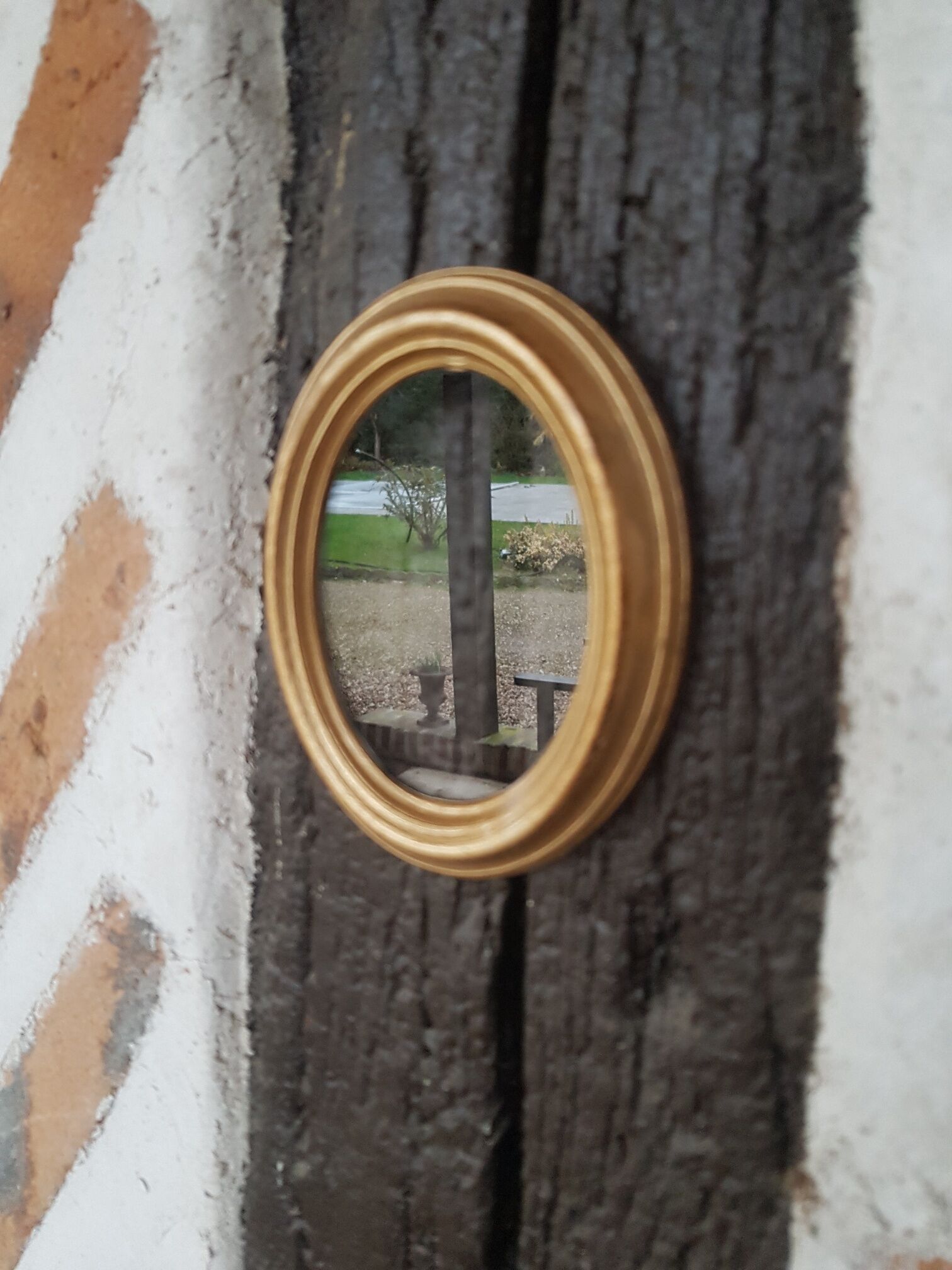 Small oval golden frame