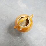 Old gargoulette pot in glazed terracotta