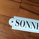 Doorbell enamel plate