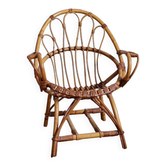 Two children's rattan armchairs