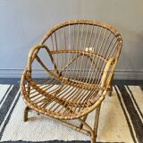 Rattan basket armchair with its cushion