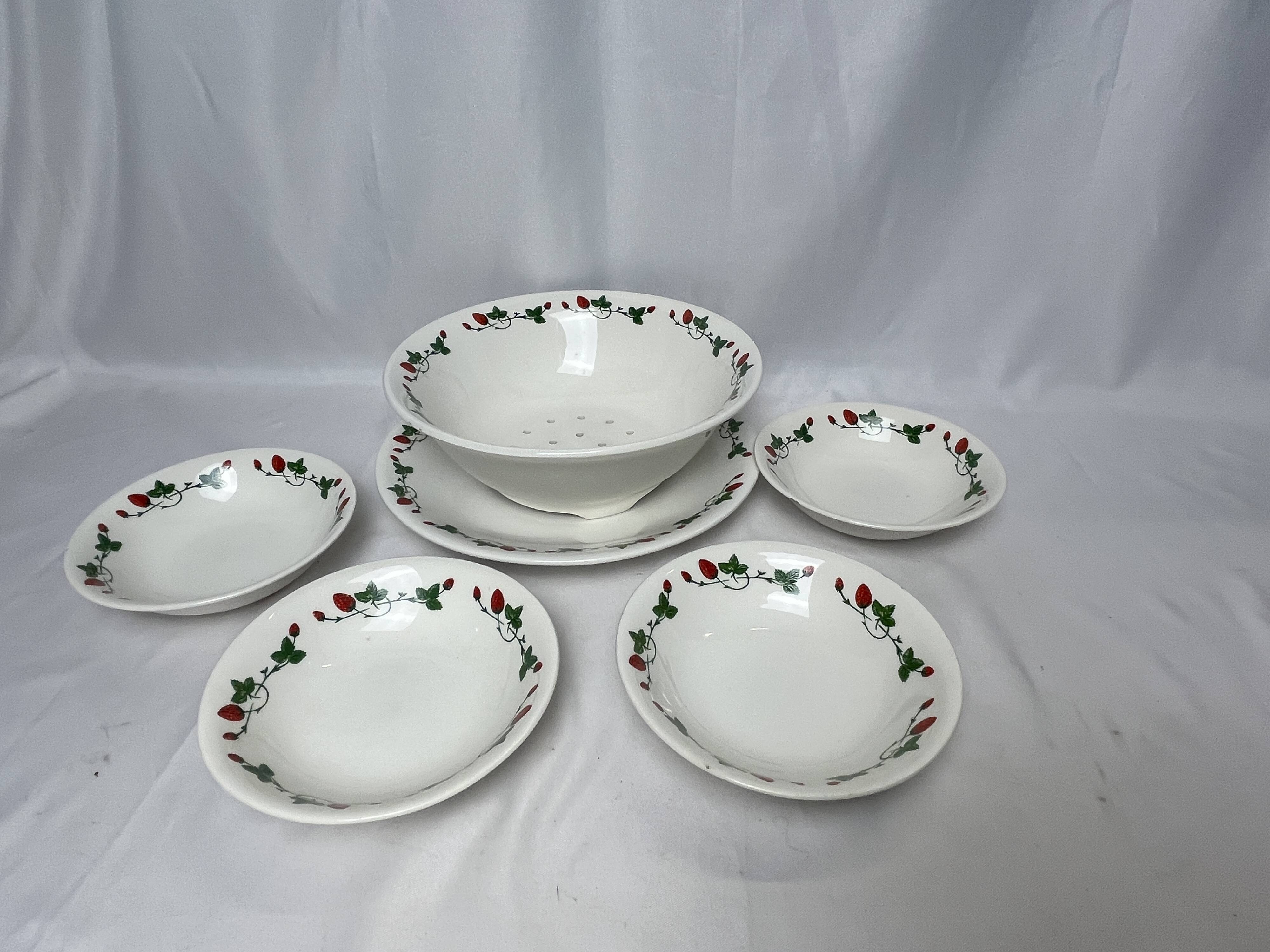 GIEN, strawberry draining bowl and earthenware dishes, 20th century