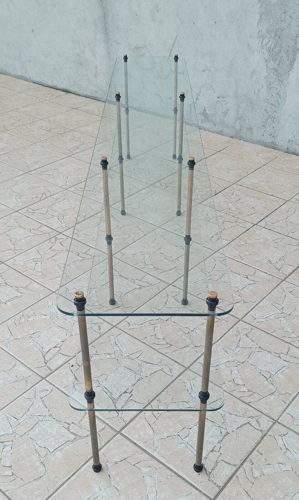 Large vintage metal and glass shop display shelf.