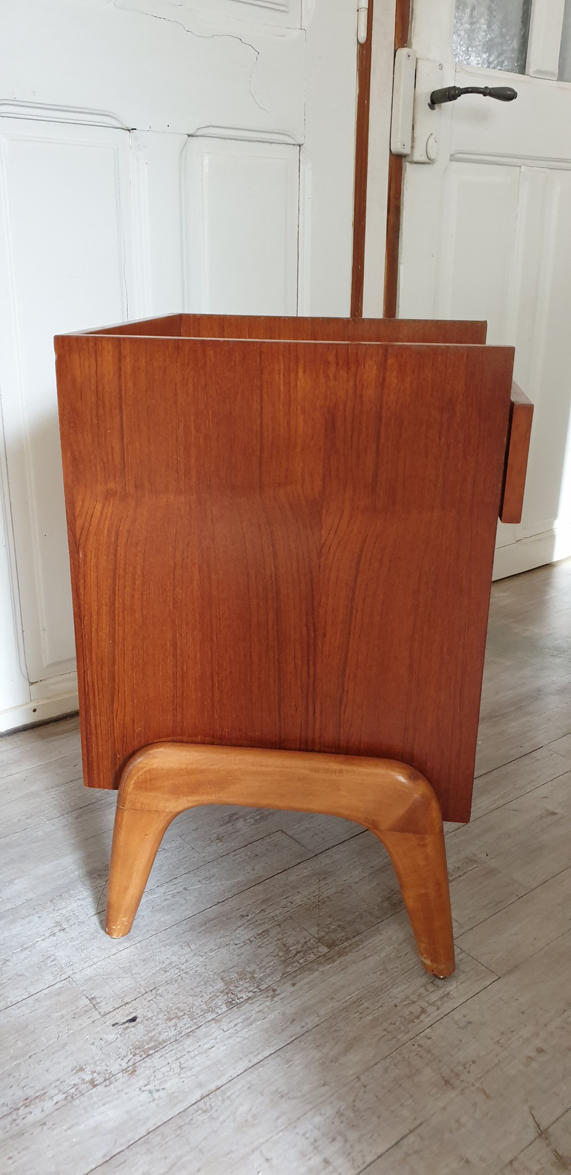 Scandinavian-style compass-footed bedside