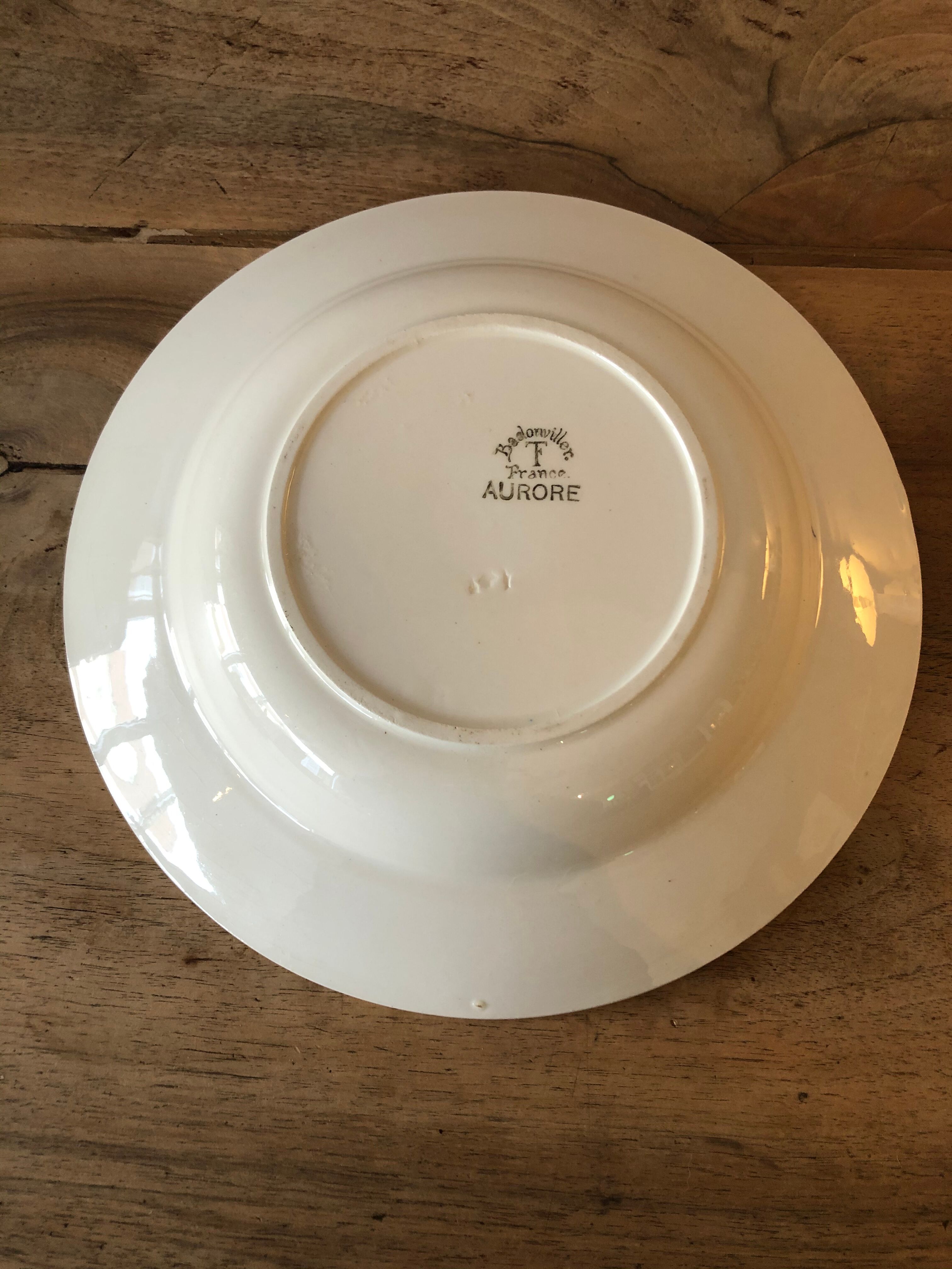 Round dish in ancient earthenware