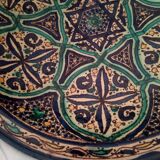 Very large Moroccan dish in enamelled earthenware. Late 19th century, early 20th century.