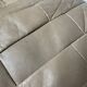 Pair of De Sède patchwork leather poufs