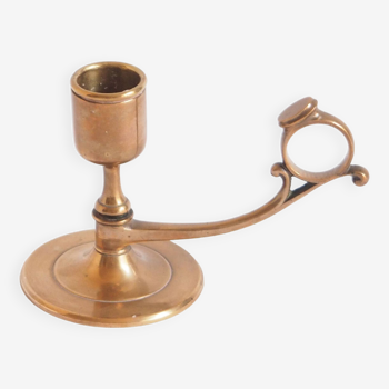 Low coppery brass candle holder