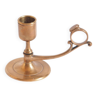 Low coppery brass candle holder