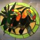 Art Deco style stained glass window representing a couple of toucans