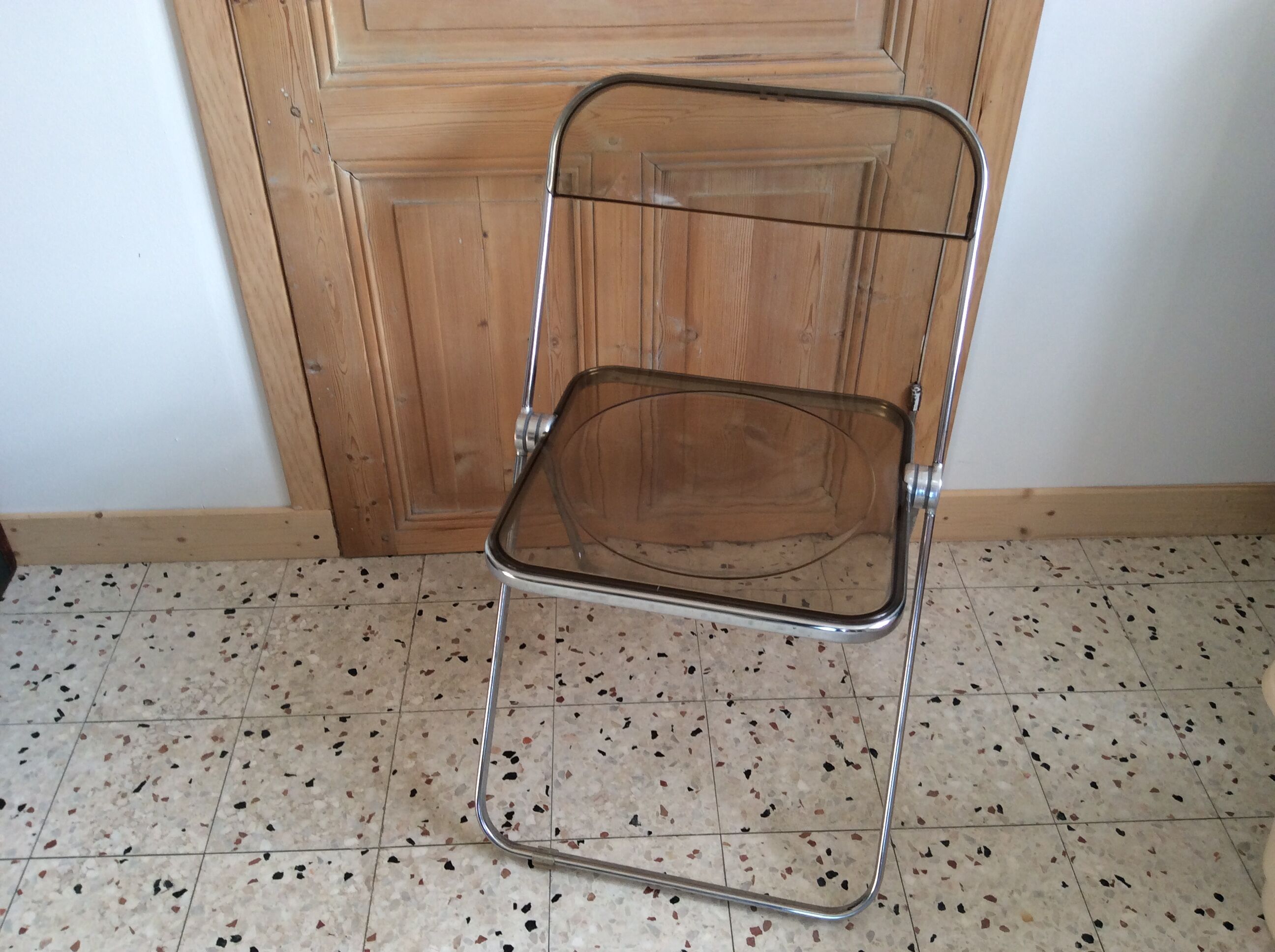 Folded chair by Giancardo Piretti for Castelli