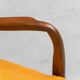 Scandinavian vintage armchair in orange fabric and wood, 1960s modernism