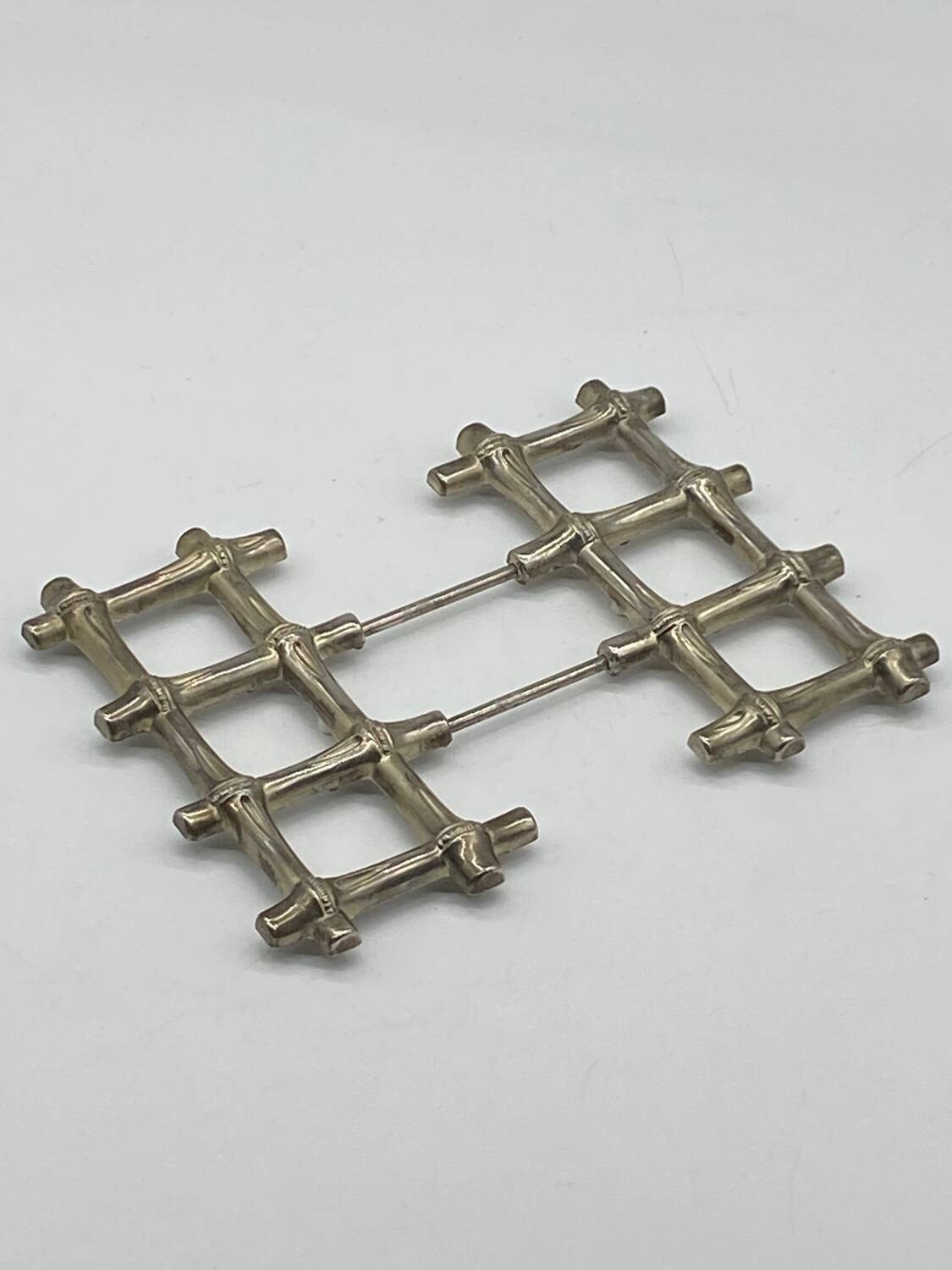 Vintage extendable metal trivet imitation bamboo