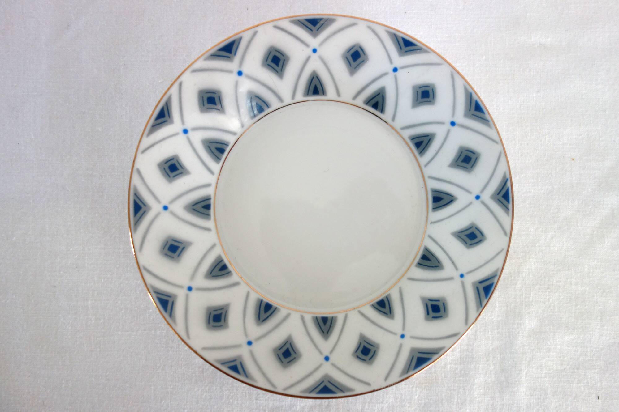 Tasse à thé avec soucoupe en porcelaine de Limoges années 30