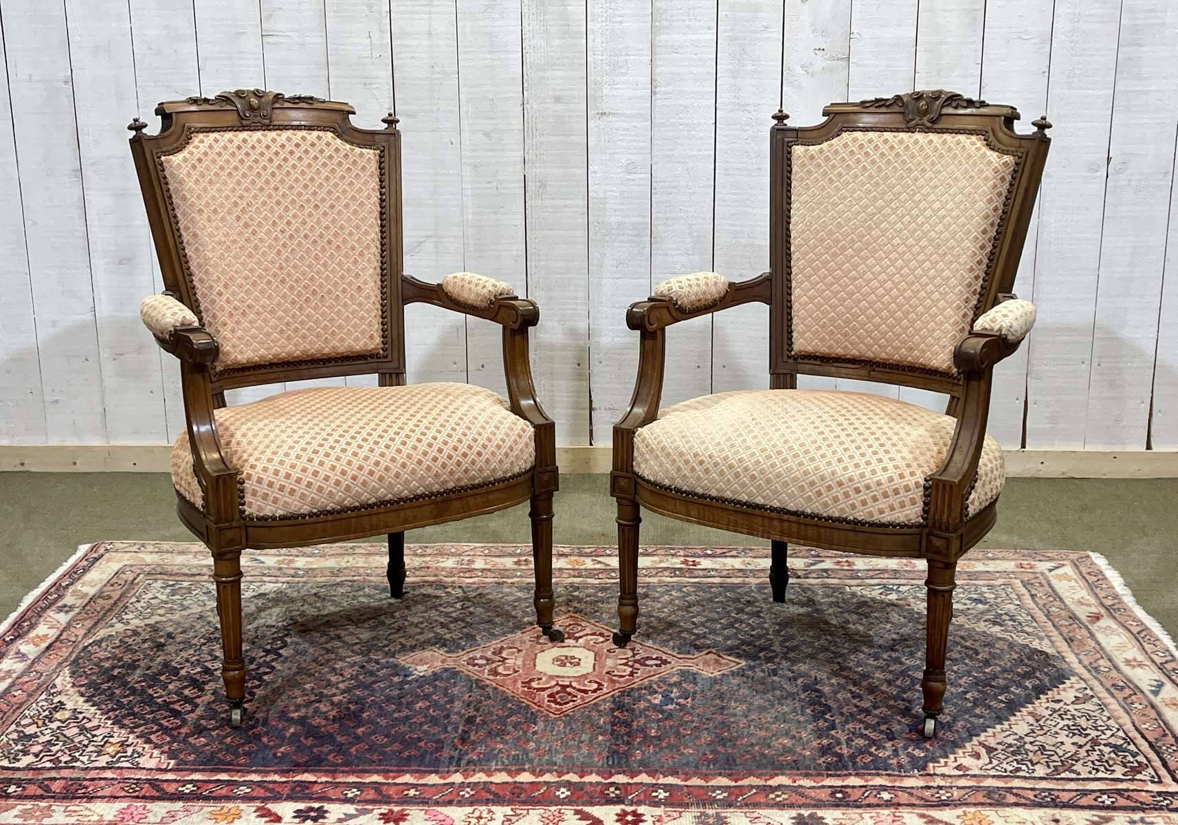 Pair of early 20th century Louis XVI armchairs in walnut
