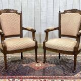 Pair of early 20th century Louis XVI armchairs in walnut