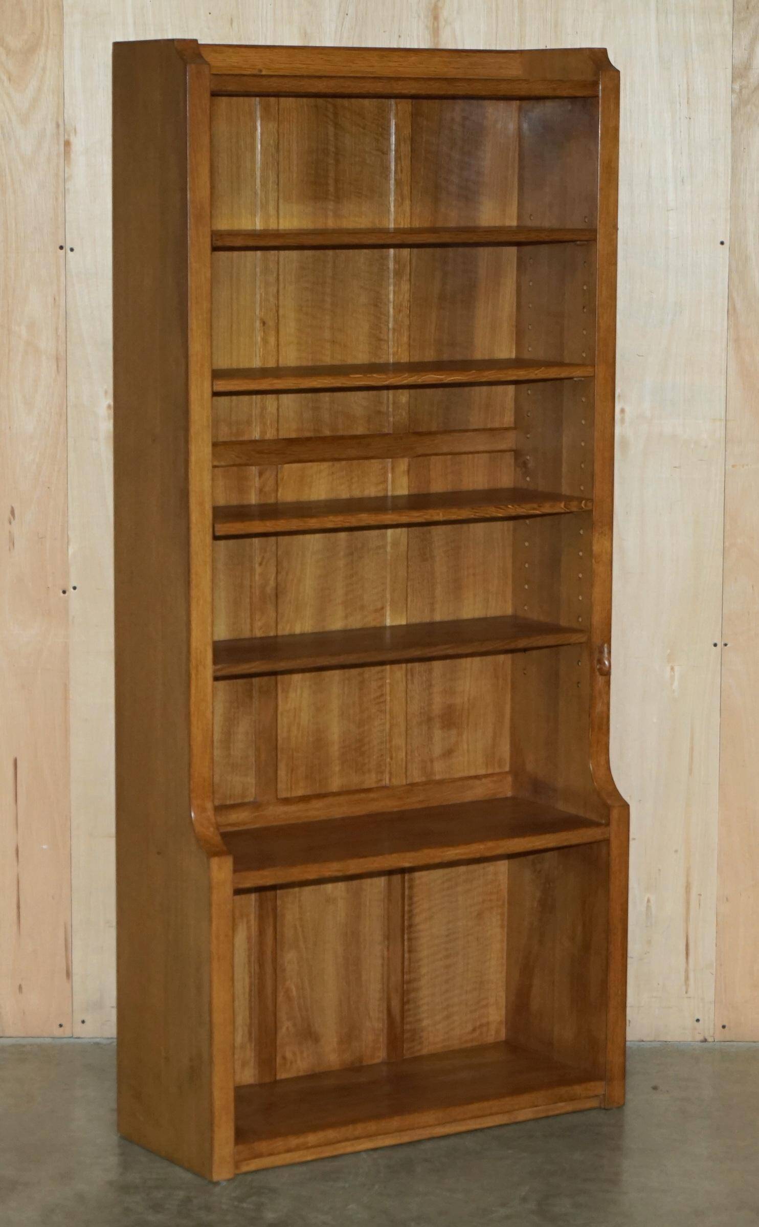 Pair of Robert Mouseman Thompson oak carved bookshelves.