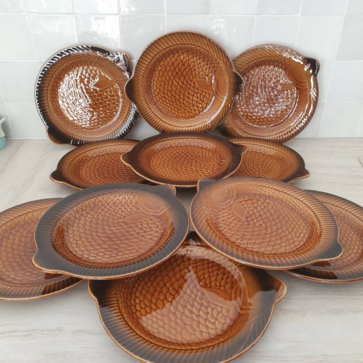 Sarreguemines / 11 earthenware fish-shaped plates