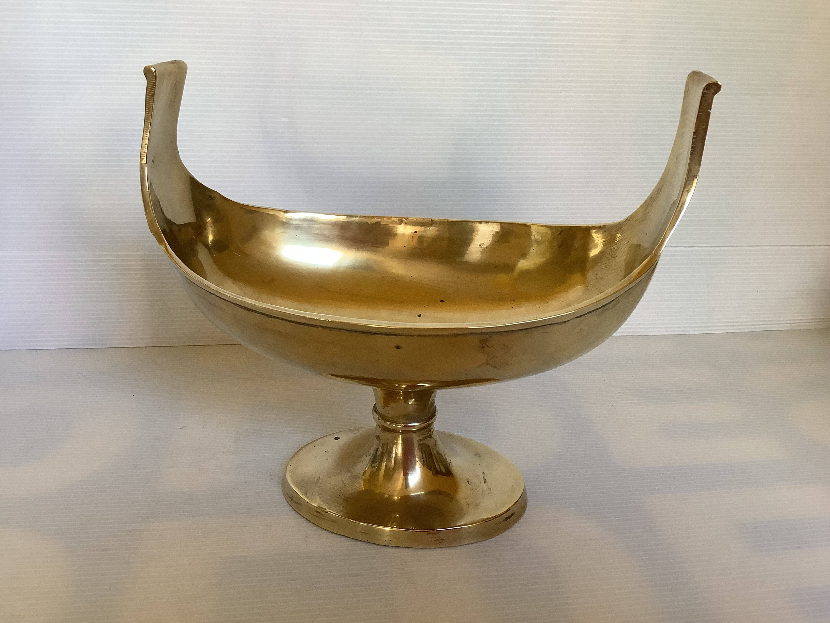 Brass cup emptier