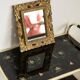 Decorative gold mirror mid-century in a wooden frame, Italy, 1960s.