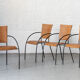 Set of 4 stackable dining chairs in steel and rattan, 1970s