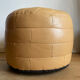 Beige patchwork leather pouf from Sède