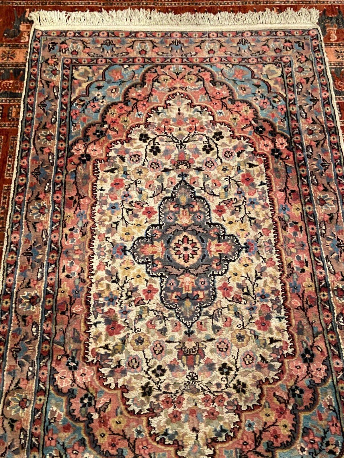 Hand-knotted oriental wool rugs