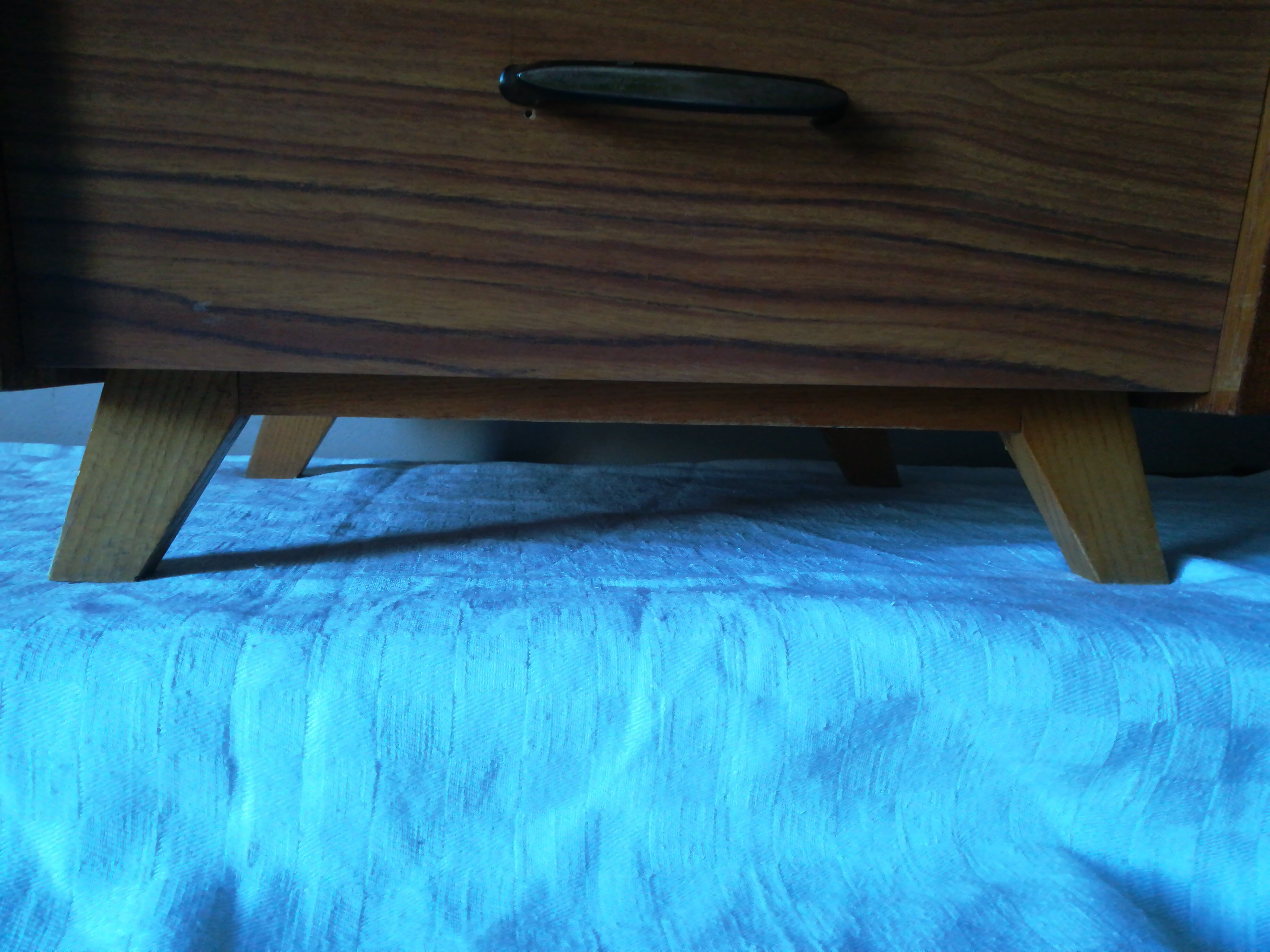 Nightstand with compass feet