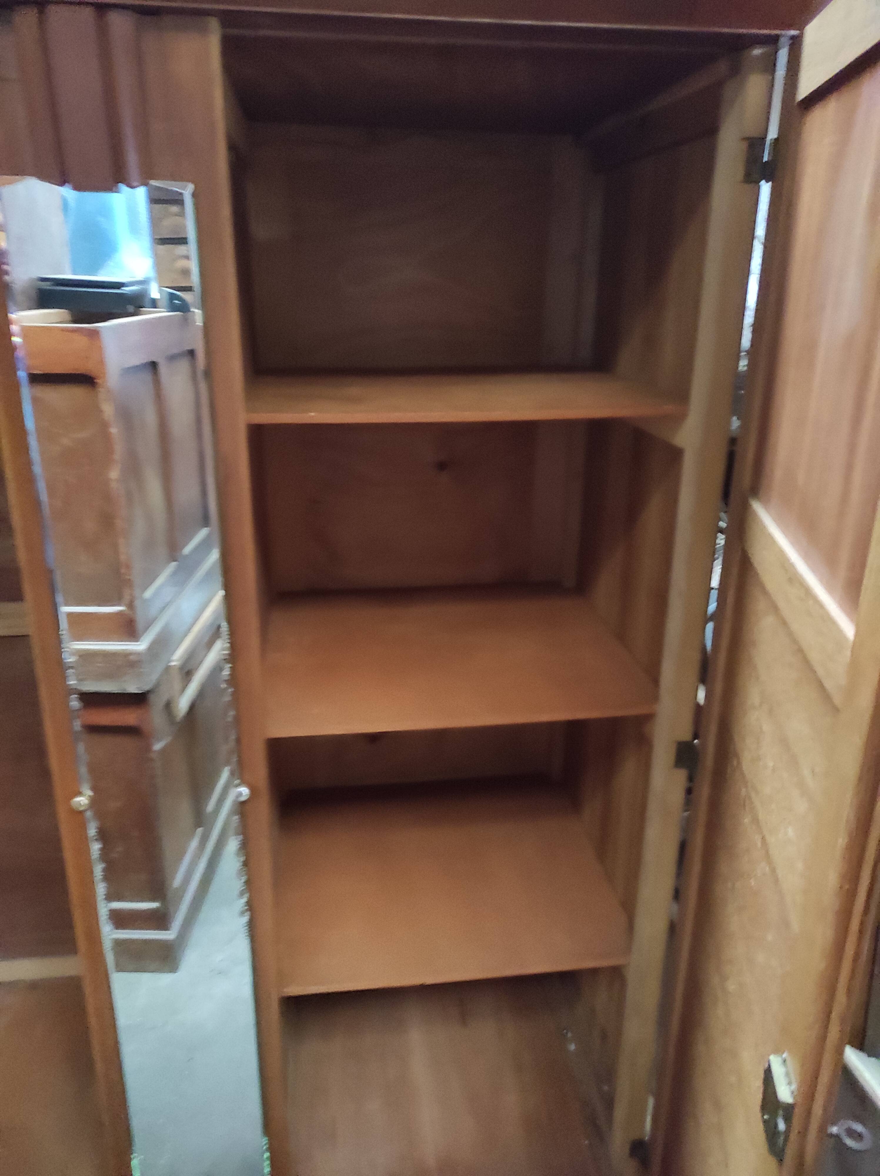 Vintage wardrobe with compass feet and central mirror Scandinavian style design