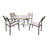 Garden furniture in stone with a vintage 1970s iron base.