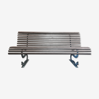 Wooden and vintage metal outdoor bench.