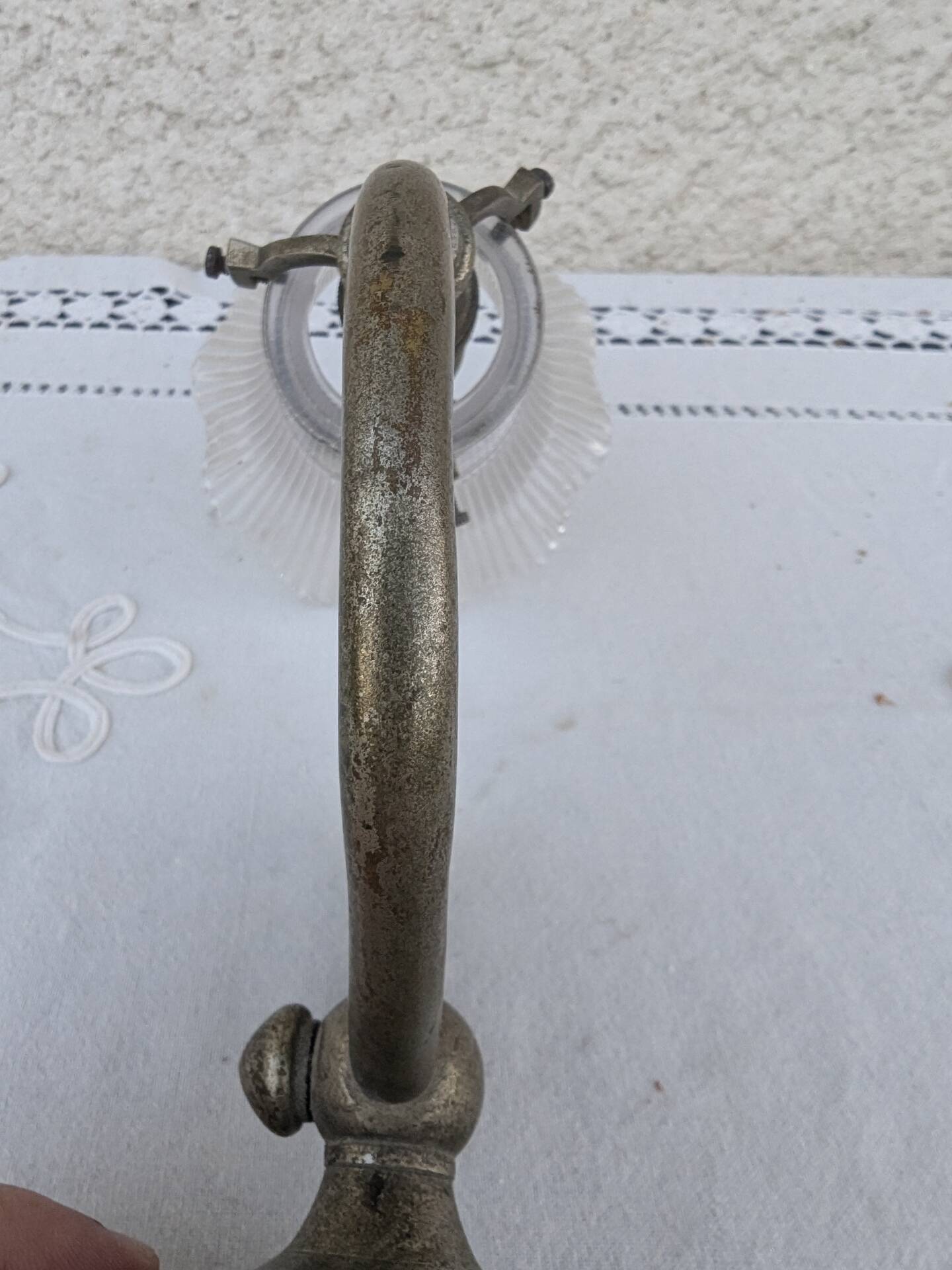 Vintage wall sconce in brass with Holophane glass tulip.