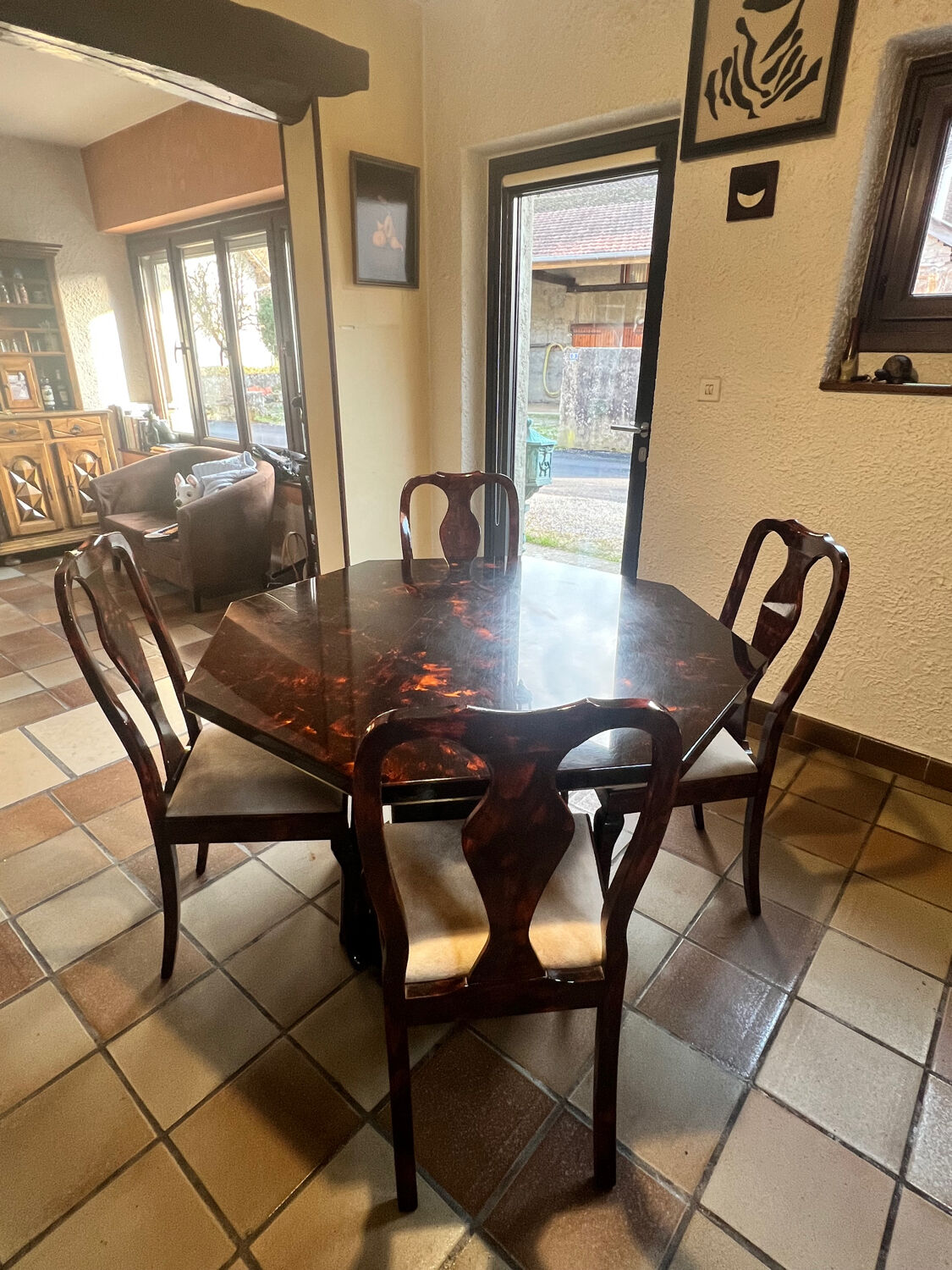 Table signed by Eric Maville and its 4 chairs.