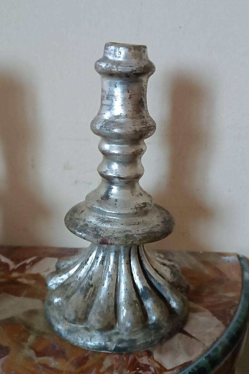 Rare pair of antique silvered terracotta candlesticks from the 17th century.