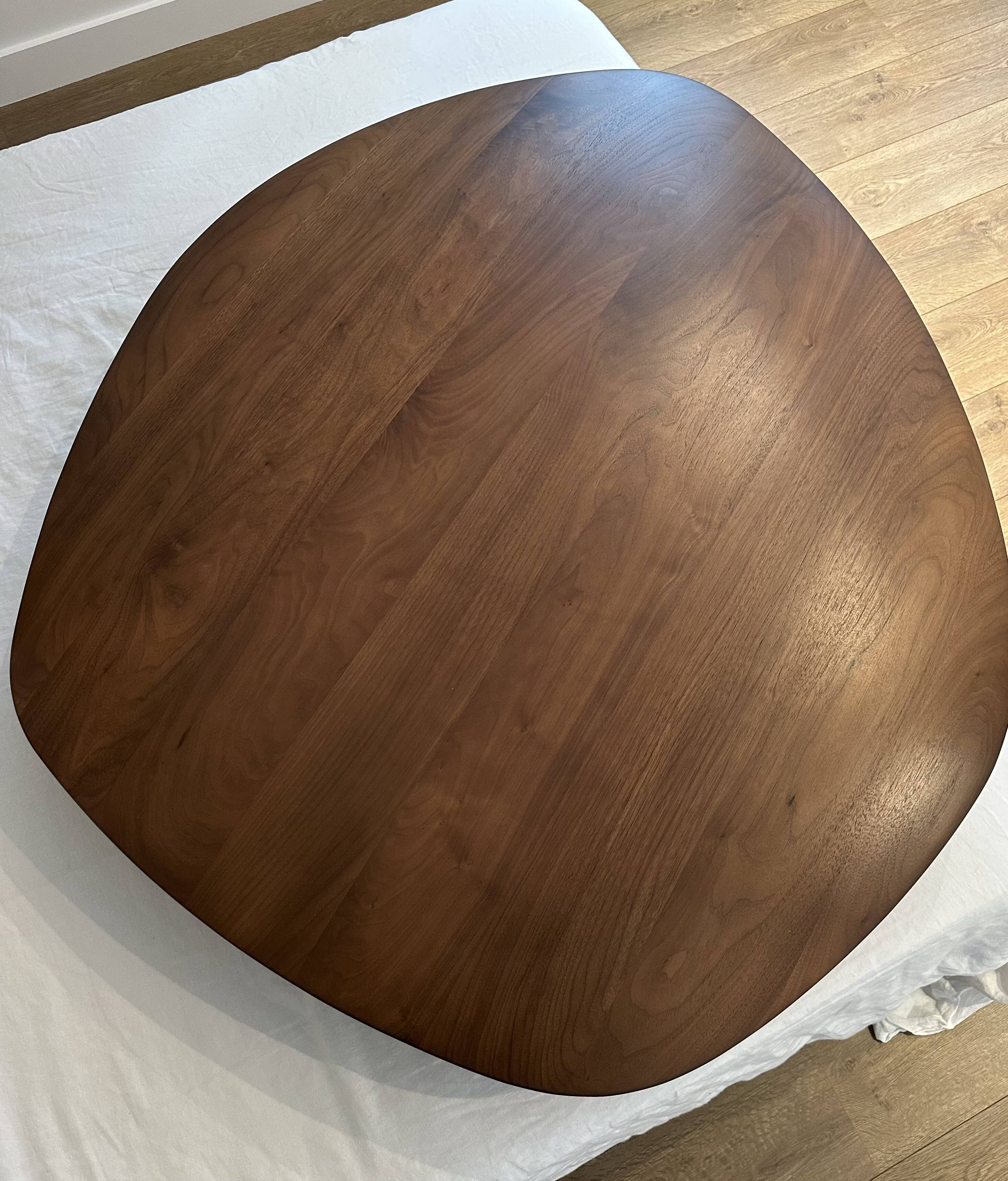 Pebble coffee table with a convex top by Cinna.
