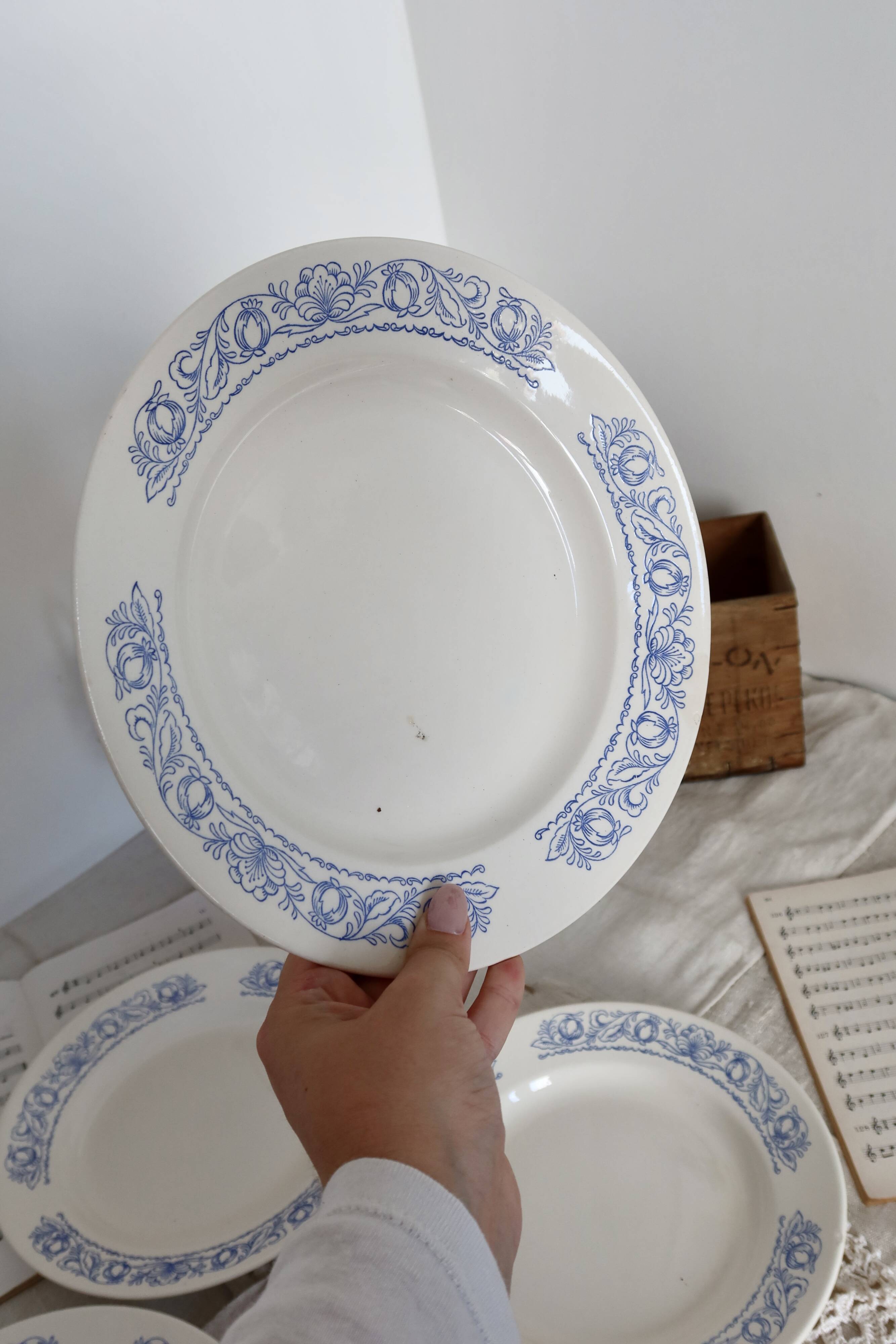 4 vintage white soup plates with blue border